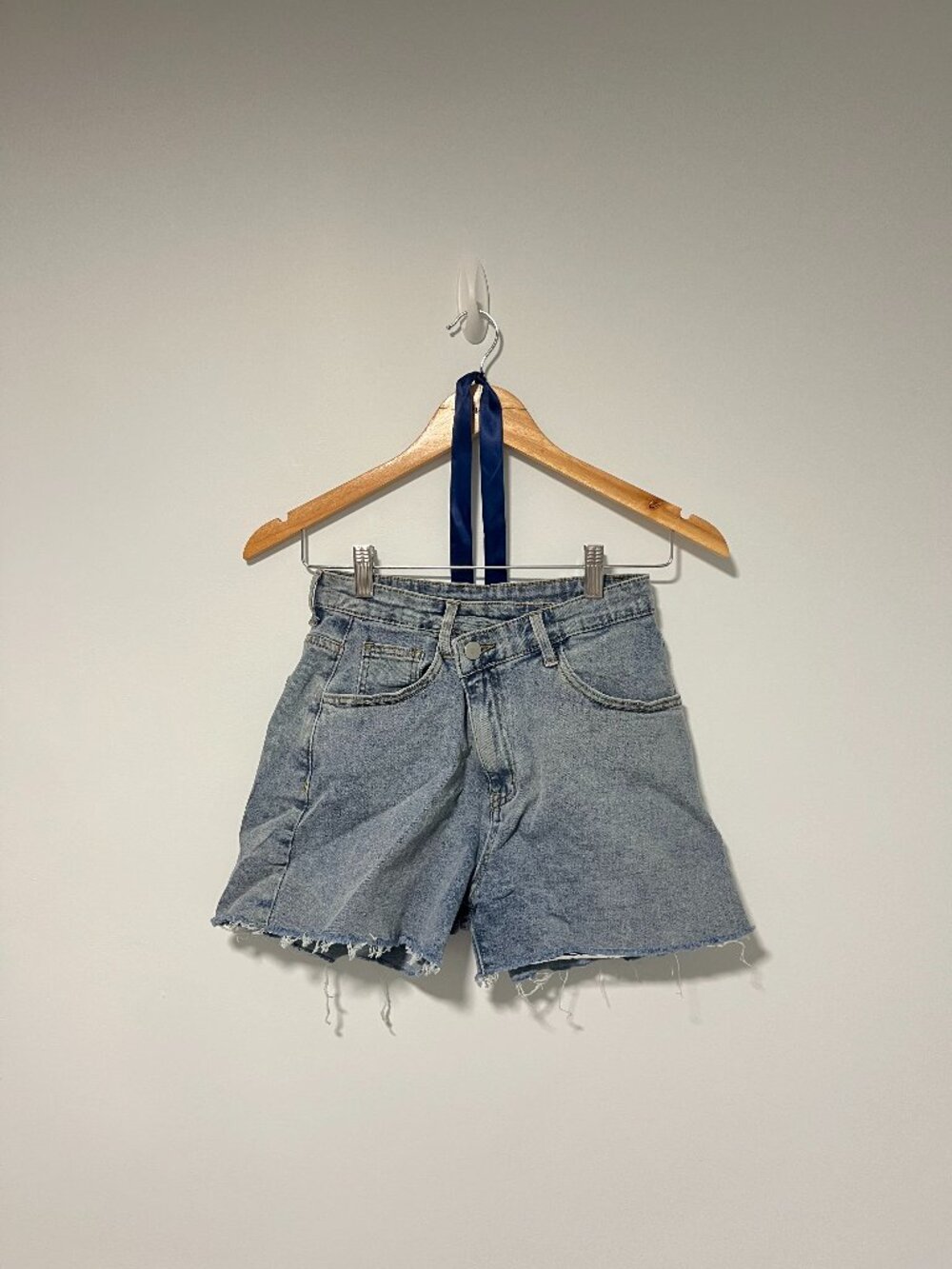 Medium Wash Denim Cutoff Shorts Raw Frayed Hem Asymmetric Button